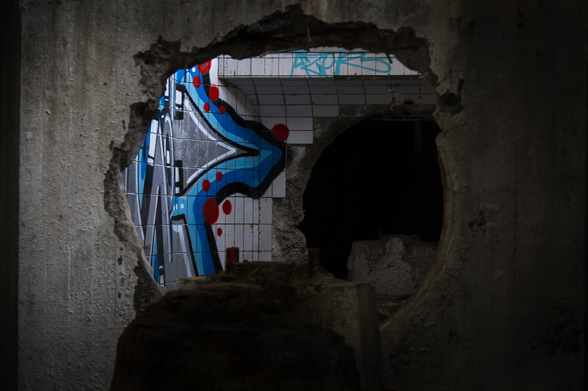 Graf in a hole - Urban Exploration Photography